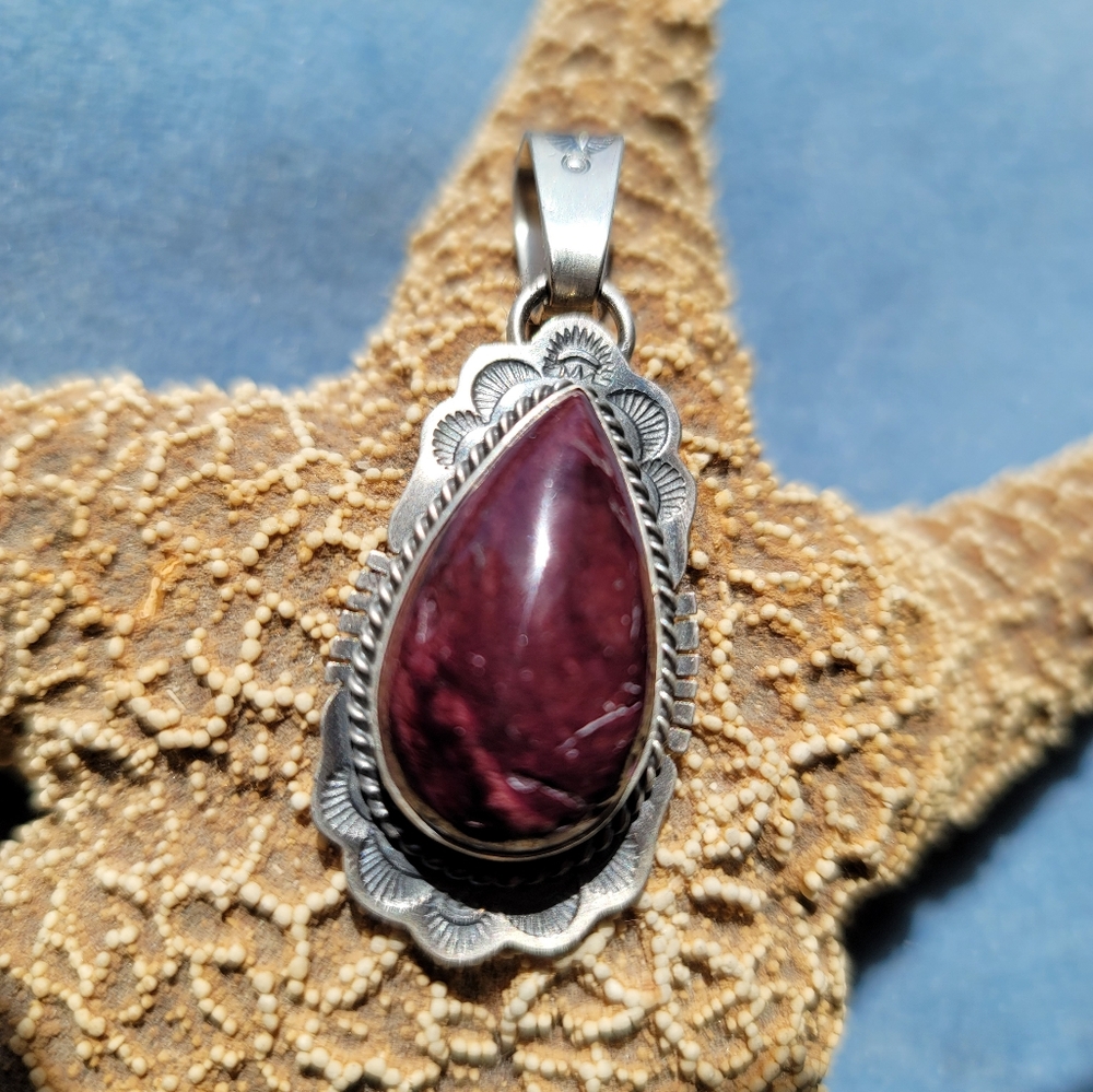 SOLD!! J. Nelson purple spiny pendant.